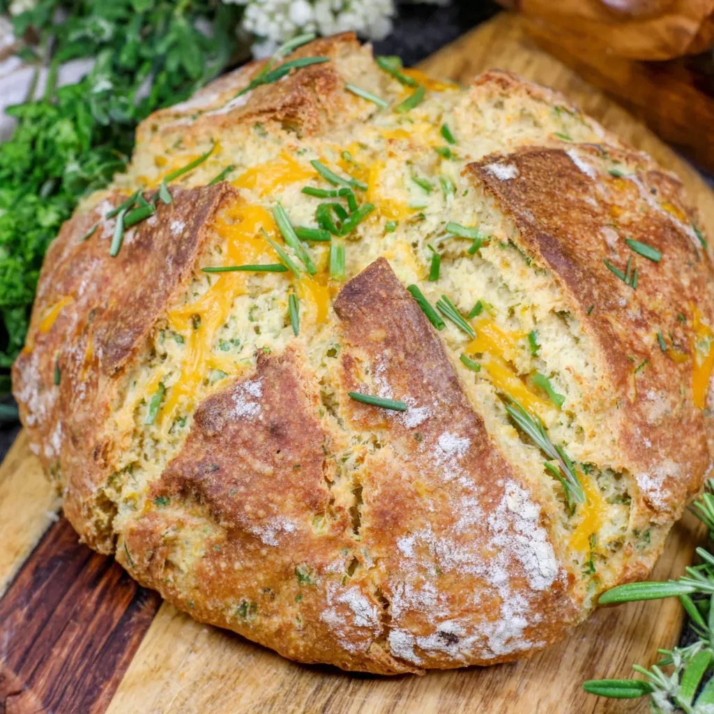 A loaf of cheddar and herb soda bread.